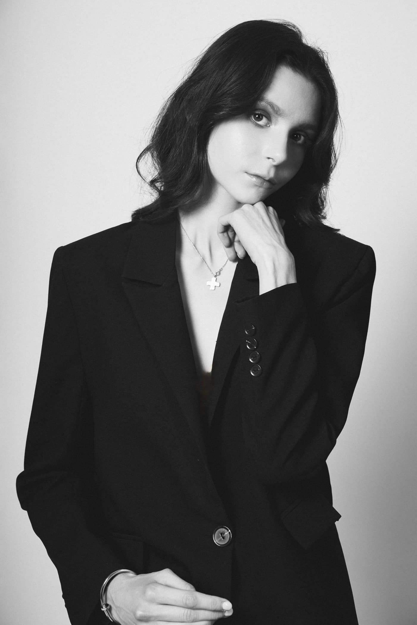 Black and white portrait of Lydia in a black blazer